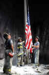 Click on the Thomas E. Franklin photo archive of the three FDNY firefighters raising the American flag for a larger image.