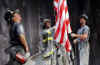 Click on the Thomas E. Franklin photo archive of the three FDNY firefighters raising the American flag for a larger image.