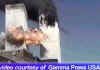 A mysterious flying object near the WTC Tower captured on videotape. Click on the photo for a large image.