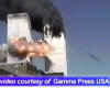 A mysterious flying object near the WTC Tower captured on videotape. Click on the photo for a large image.