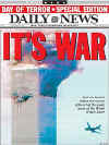 Click on the NY Daily News newspaper front page headlines photo for a larger image. On September 11, 2001 US Newspapers print same day Extra editions and Americans read about the terrorist attacks on New York City and The Pentagon.