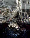 NYC Image  Reuters. In the aftermath of the September 11, 2001 terrorist attacks on the World Trade Center in New York City, firemen and rescue workers search for survivors, and extenguish flames in the massive rubble from the 09-11-2001 attack.