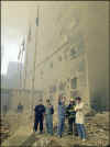 NYC Image  AP. In the aftermath of the September 11, 2001 terrorist attacks on the World Trade Center in New York City, firemen and rescue workers search for survivors, and extenguish flames in the massive rubble from the 09-11-2001 attack.