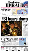 Click on the USA newspaper front page headlines and covers pictures for a larger newspaper cover image from the week of 9-11-2001.