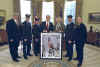 Click on the Thomas E. Franklin photo archive of the three FDNY firefighters raising the American flag for a larger image.