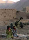 Click on the November 23rd photo of Northern Alliance troops praying in Konduz province for a larger image.