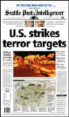 Click on the newspaper headline images of October 7-8, 2001 for a larger image.