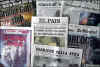 Click on the newspaper front page headlines photo for a larger image. On September 11 and 12, 2001 the world's newspapers print special editions and the world reads about the terrorist attacks on New York City and The Pentagon on 9-11-2001.